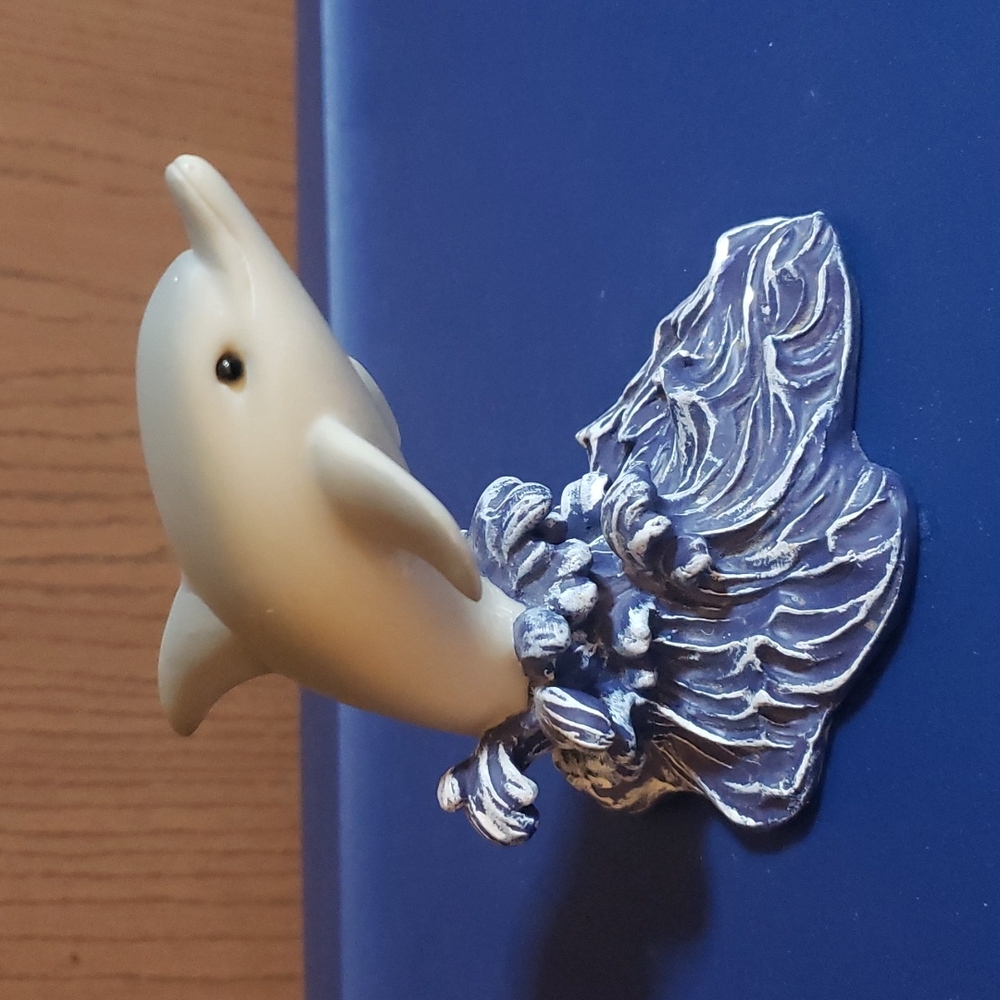 3/$10 - one (1) SeaWorld Dolphin figurine